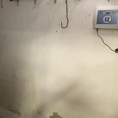 Removal of moisture in the basement walls of a residential building